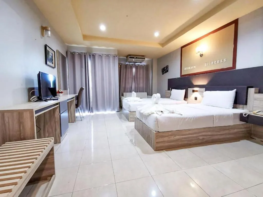 Bed in Atikarn Princess Hotel & Resort