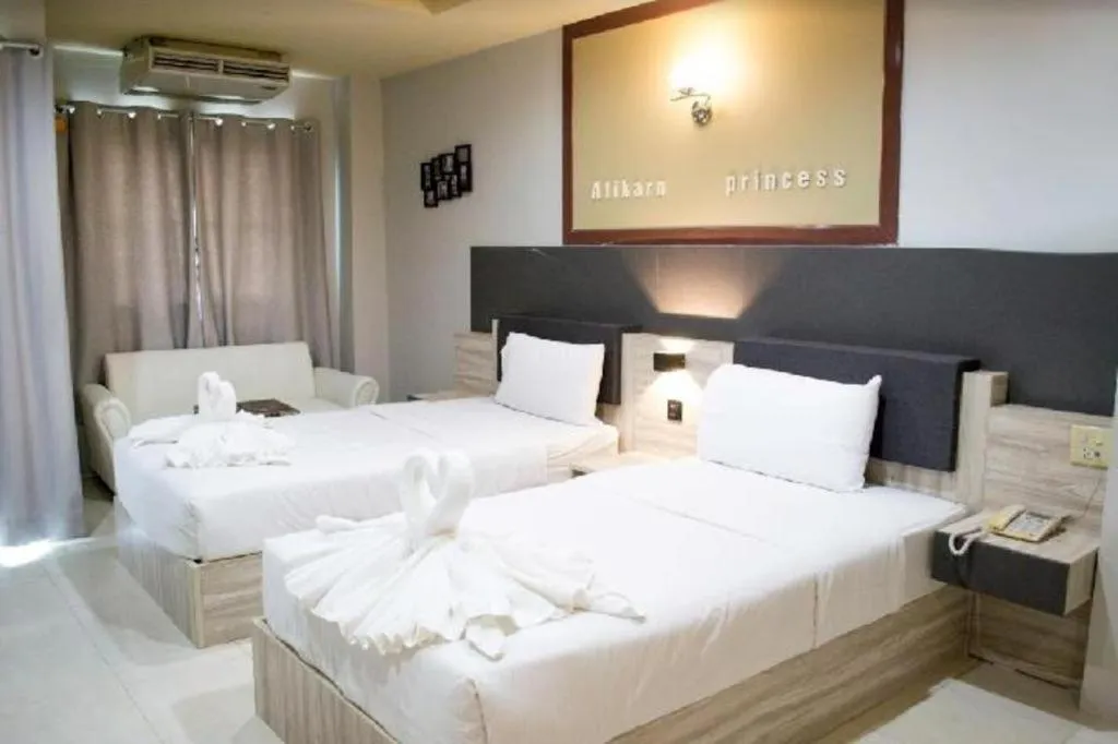 Bed in Atikarn Princess Hotel & Resort