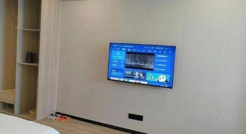 Bed in GreenTree Inn Shenzhen Kengzi Town Express Hotel