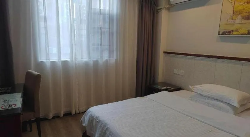 Bed in GreenTree Inn Shenzhen Kengzi Town Express Hotel