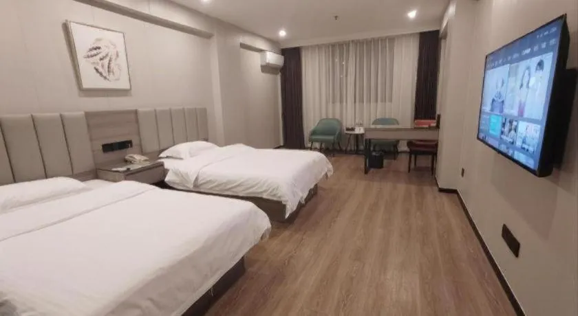 Bed in GreenTree Inn Shenzhen Kengzi Town Express Hotel