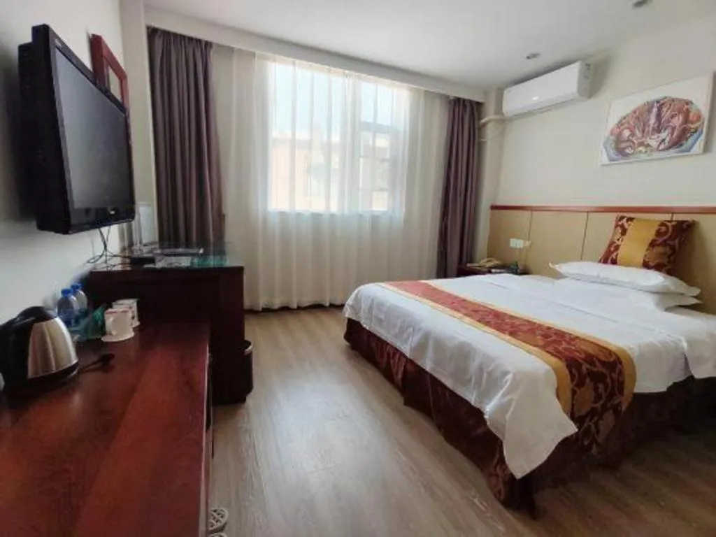 Bed in GreenTree Inn Shenzhen Kengzi Town Express Hotel