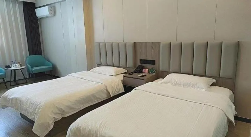 Bed in GreenTree Inn Shenzhen Kengzi Town Express Hotel