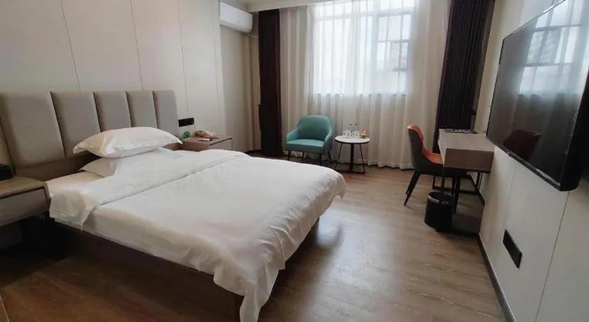 Bed in GreenTree Inn Shenzhen Kengzi Town Express Hotel