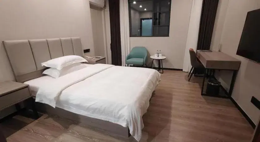 Bed in GreenTree Inn Shenzhen Kengzi Town Express Hotel Bed in GreenTree Inn Shenzhen Kengzi Town Express Hotel