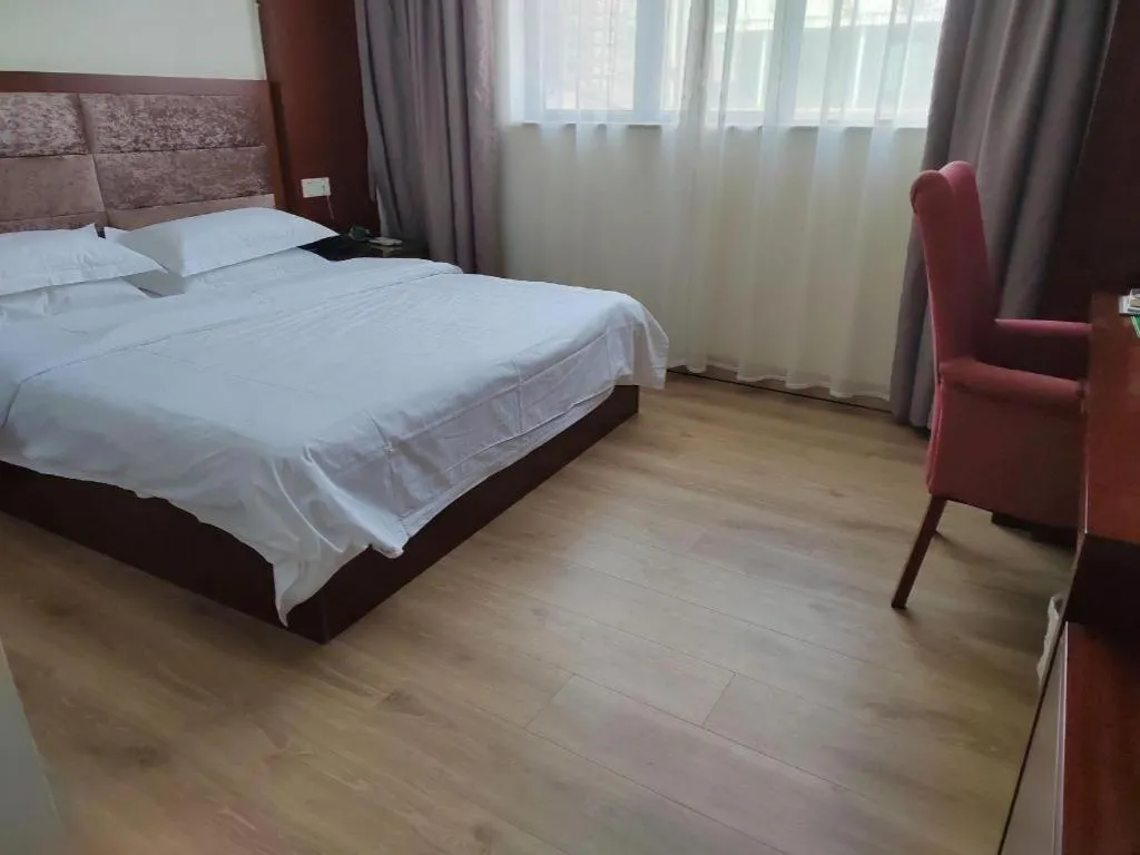 Bed in GreenTree Inn Shenzhen Kengzi Town Express Hotel