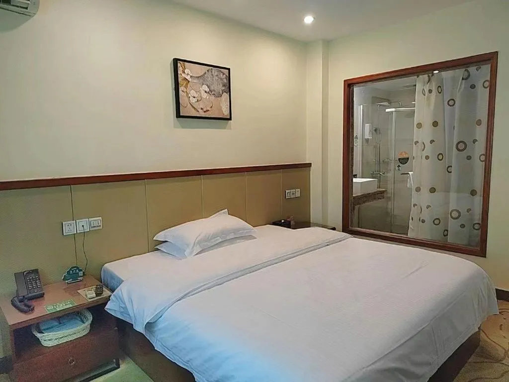Bed in GreenTree Inn Shenzhen Kengzi Town Express Hotel