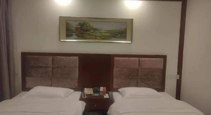 Bed in GreenTree Inn Shenzhen Kengzi Town Express Hotel