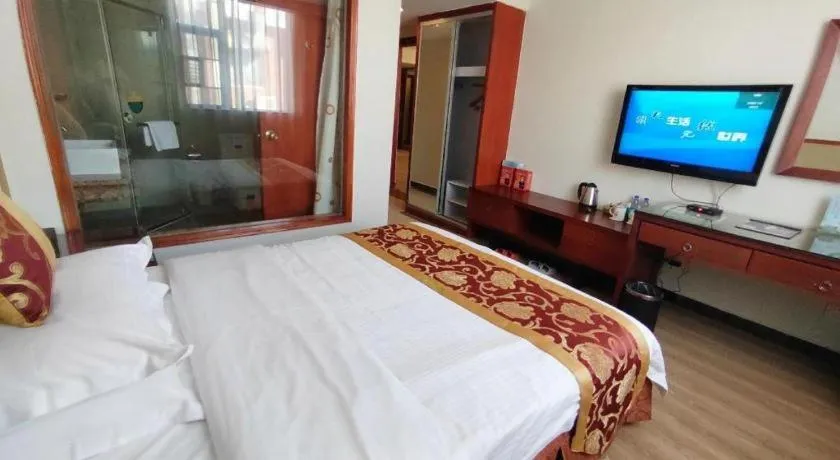 Bed in GreenTree Inn Shenzhen Kengzi Town Express Hotel