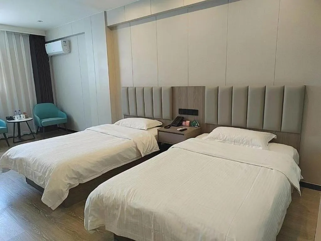 Bed in GreenTree Inn Shenzhen Kengzi Town Express Hotel