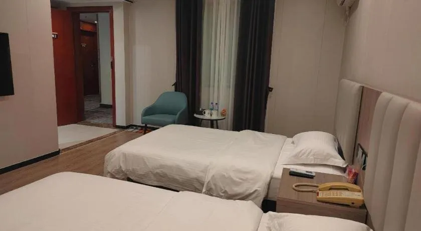 Bed in GreenTree Inn Shenzhen Kengzi Town Express Hotel