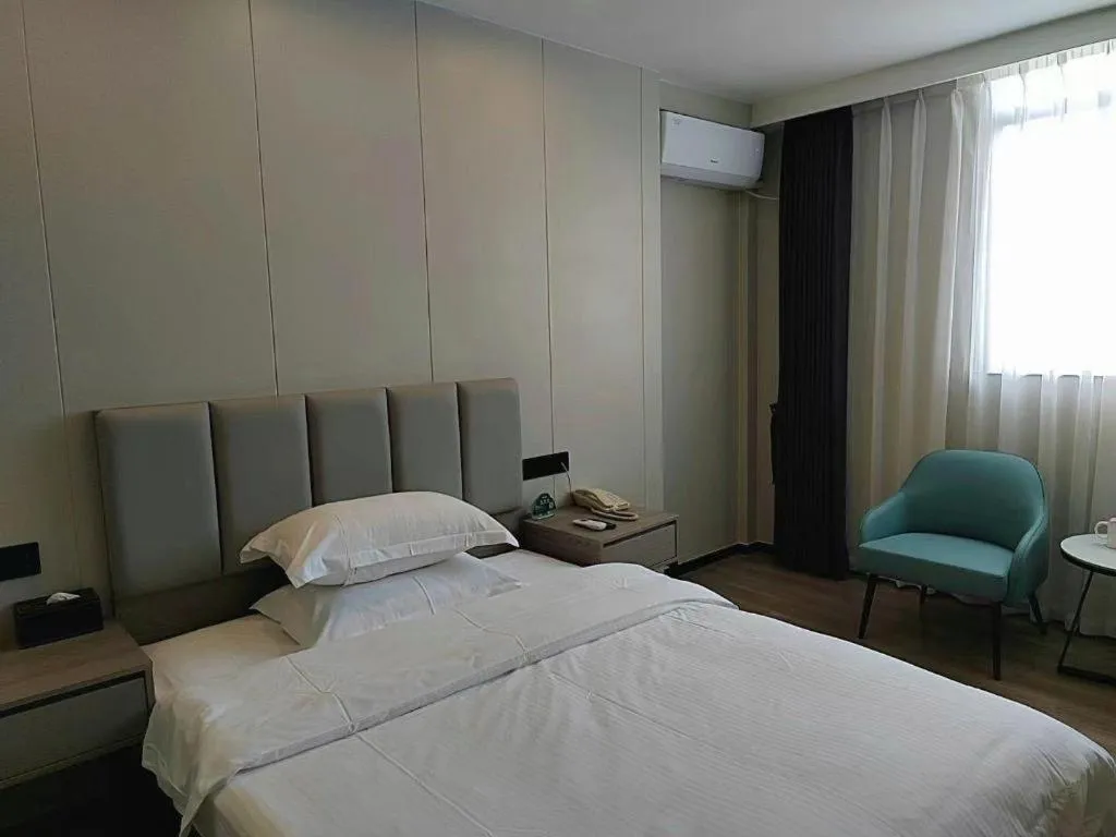 Bed in GreenTree Inn Shenzhen Kengzi Town Express Hotel