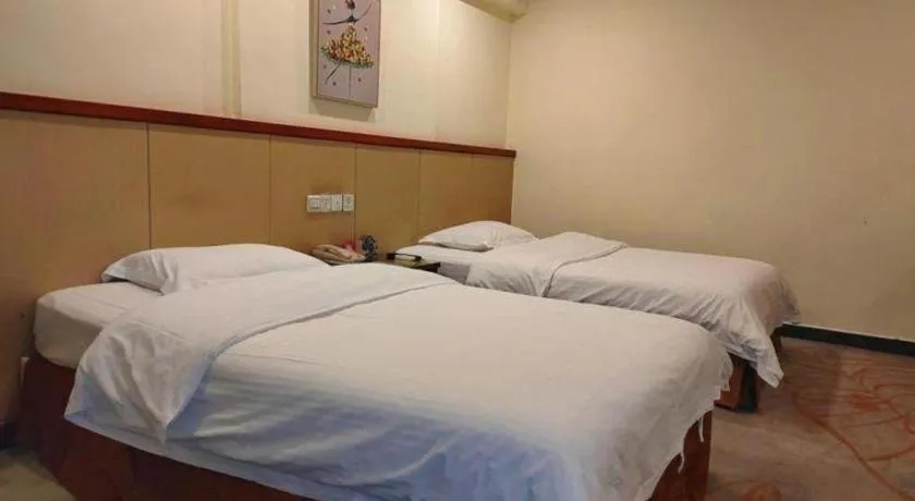 Bed in GreenTree Inn Shenzhen Kengzi Town Express Hotel