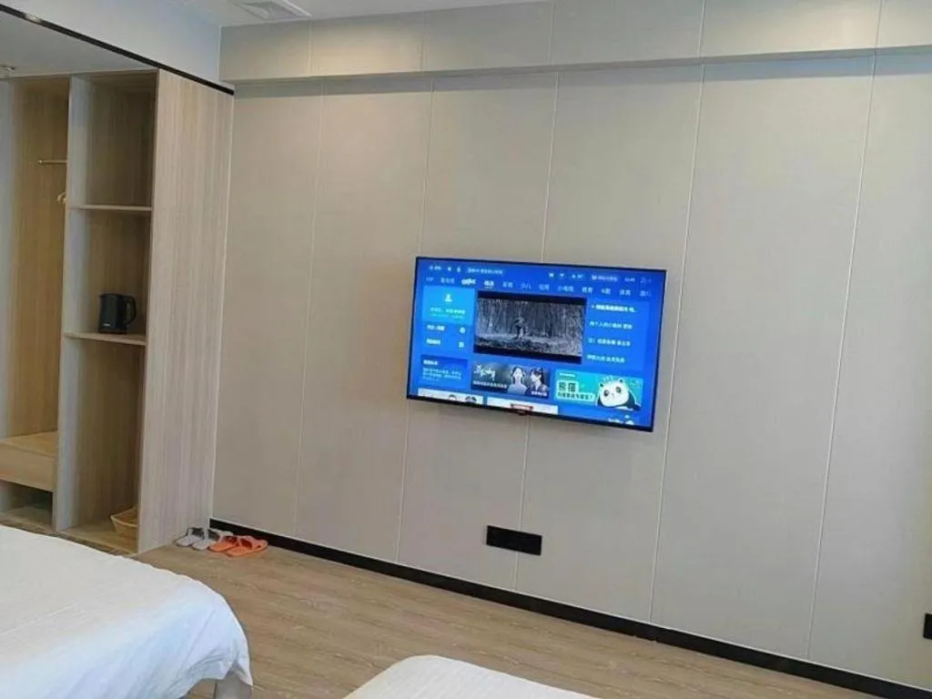 Bed in GreenTree Inn Shenzhen Kengzi Town Express Hotel