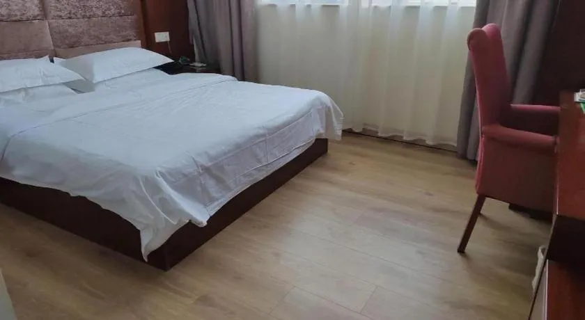 Bed in GreenTree Inn Shenzhen Kengzi Town Express Hotel