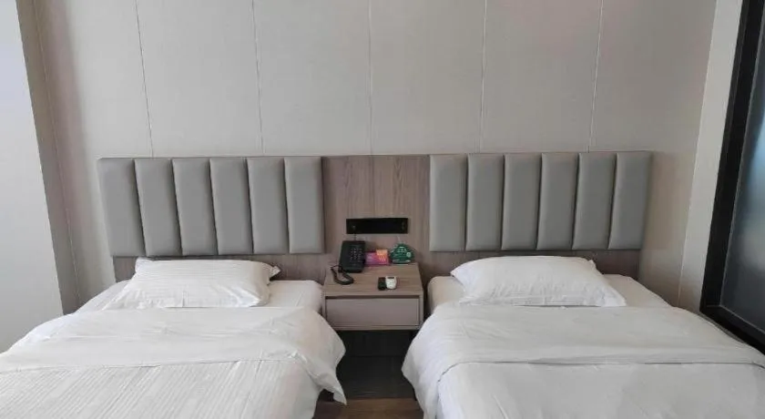 Bed in GreenTree Inn Shenzhen Kengzi Town Express Hotel