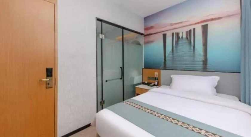 Bed in Zhenxing Hotel