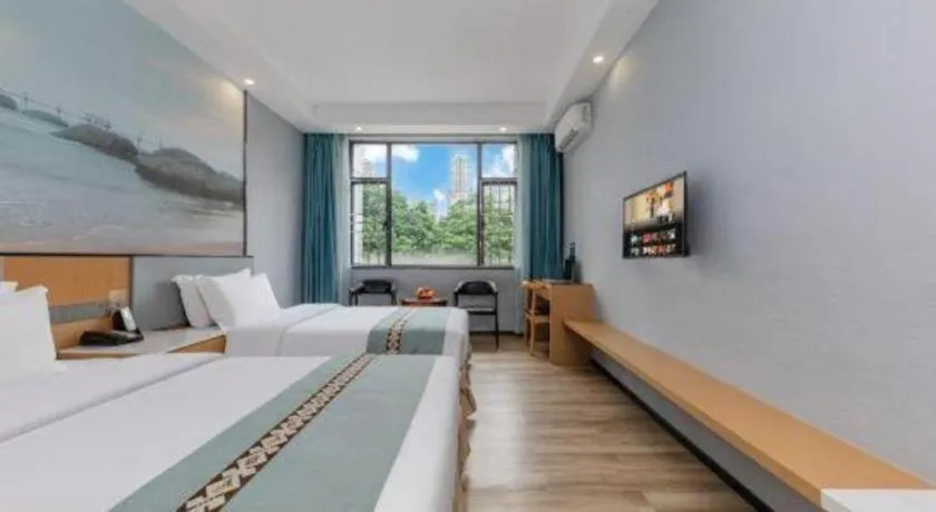 Bed in Zhenxing Hotel