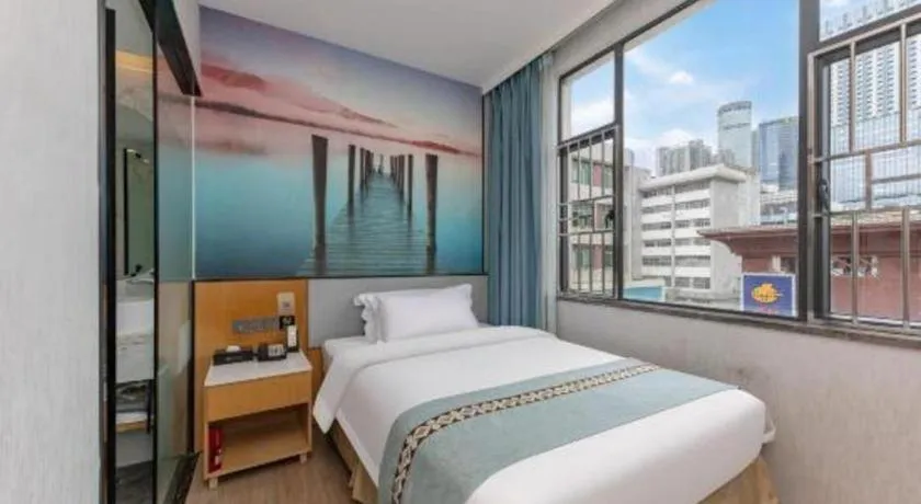 Bed in Zhenxing Hotel