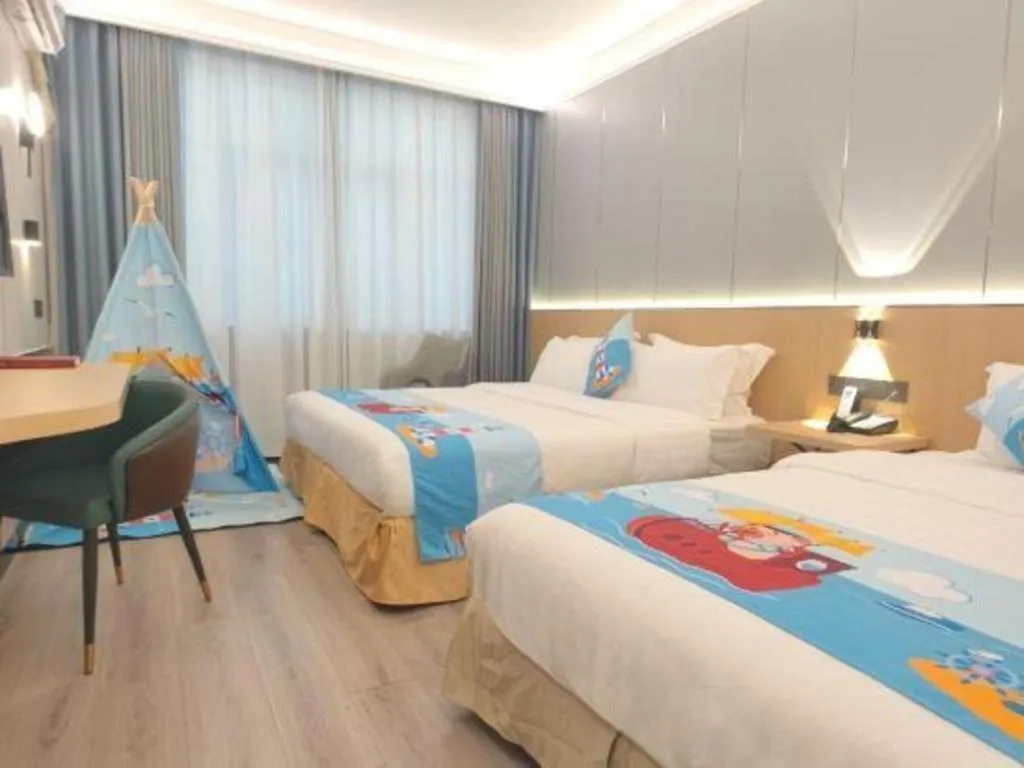 Bed in Zhenxing Hotel