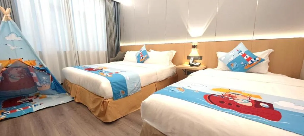 Bed in Zhenxing Hotel