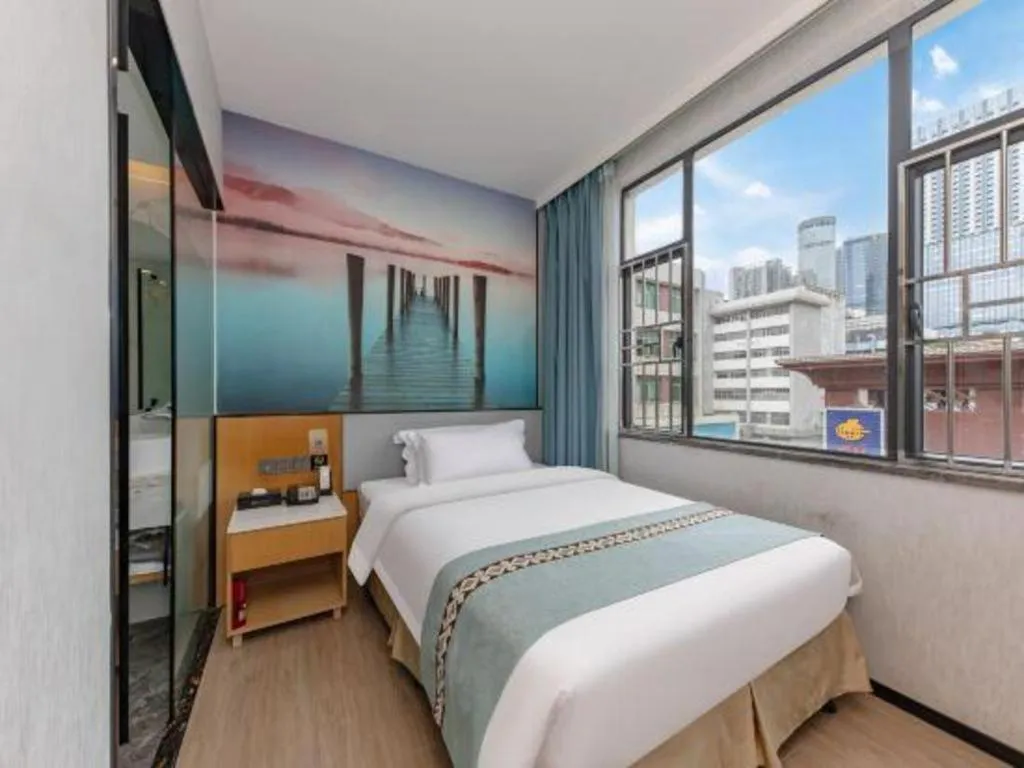 Bed in Zhenxing Hotel