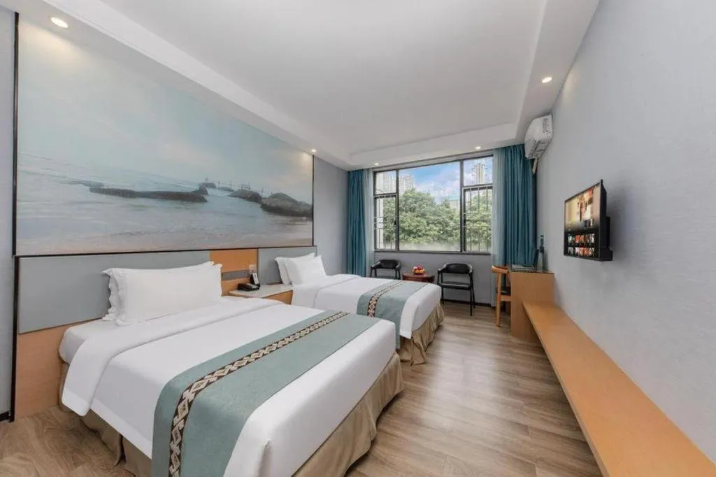 Bed in Zhenxing Hotel