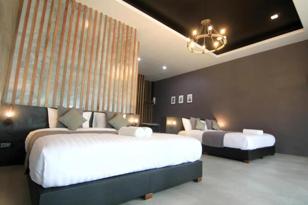 Bed in Baan Chao Mai Beach House