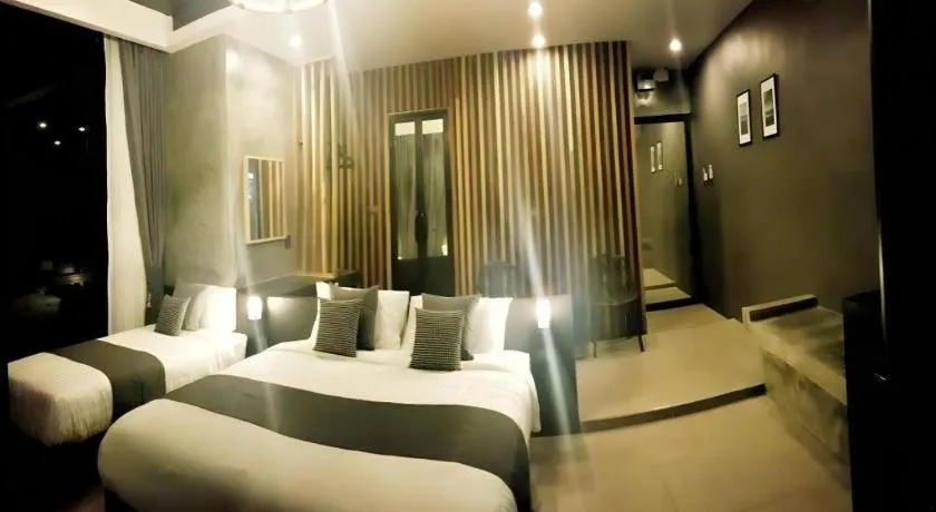 Bed in Baan Chao Mai Beach House