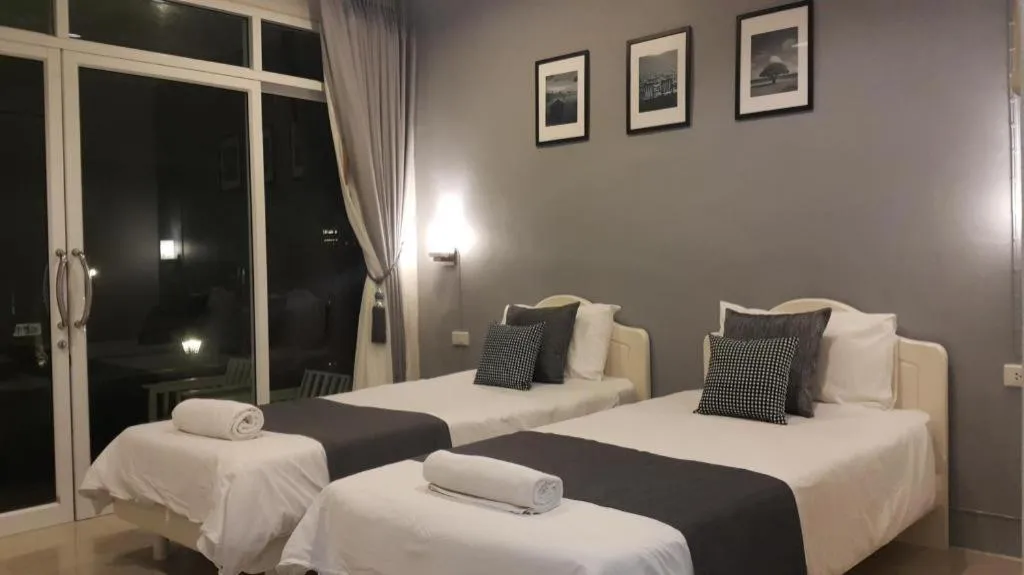 Bed in Baan Chao Mai Beach House