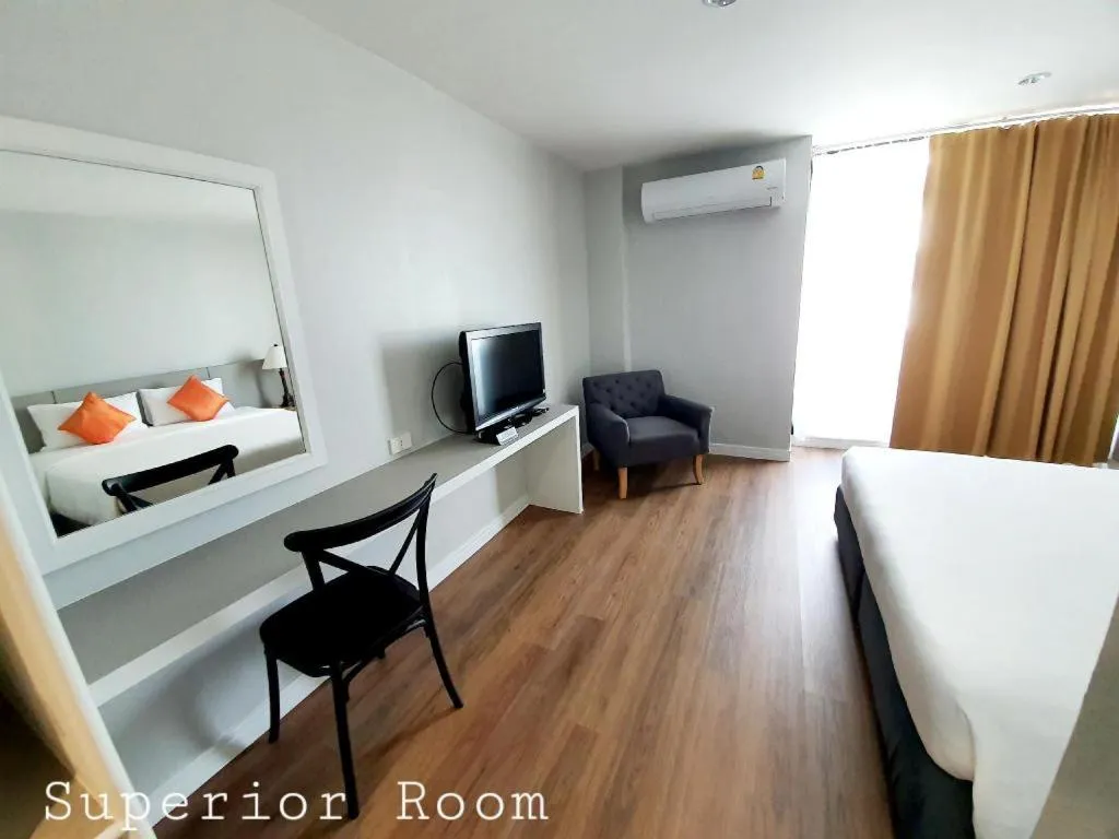 Bed in The Majestic Sakon Nakhon Hotel