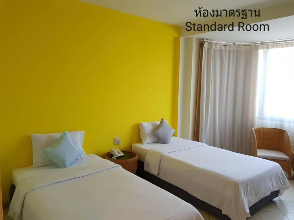 Bed in The Majestic Sakon Nakhon Hotel
