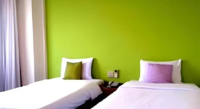 Bed in The Majestic Sakon Nakhon Hotel Bed in The Majestic Sakon Nakhon Hotel