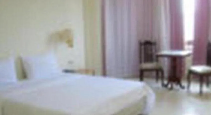 Bed in The Majestic Sakon Nakhon Hotel