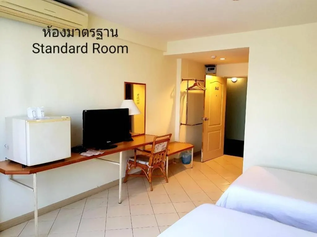 Bed in The Majestic Sakon Nakhon Hotel