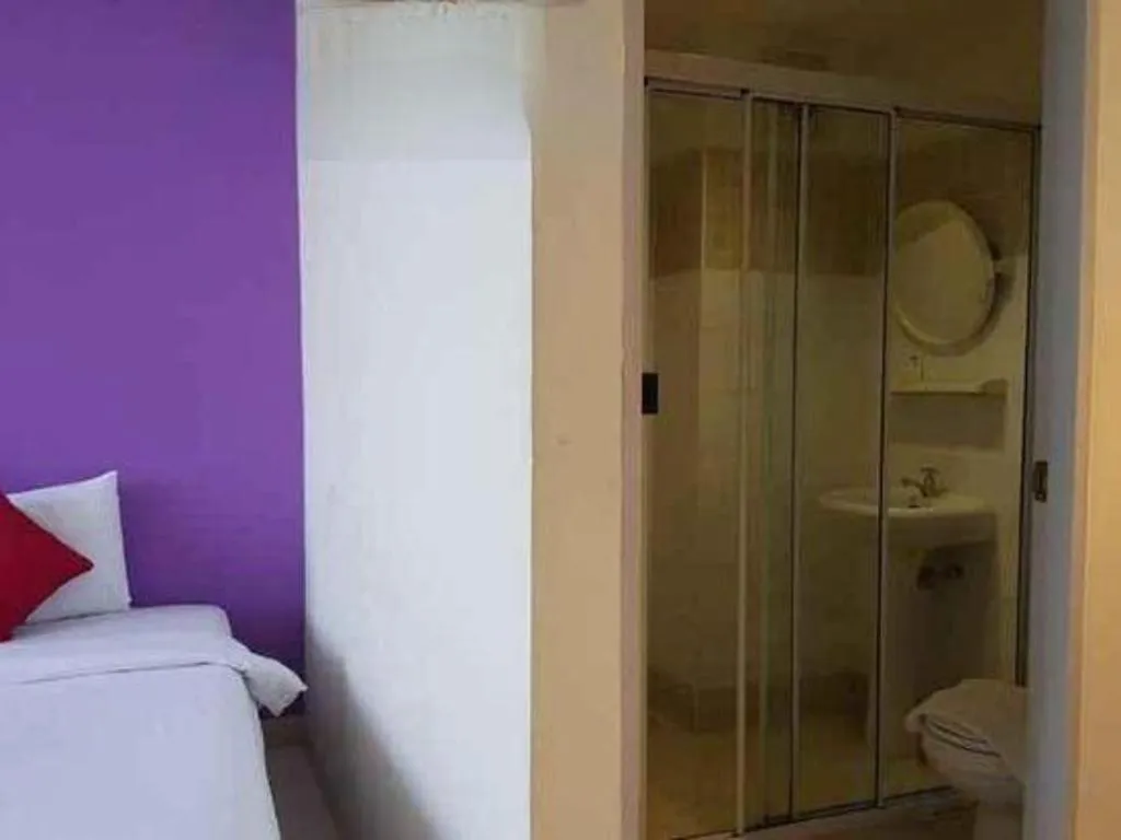 Bed in The Majestic Sakon Nakhon Hotel