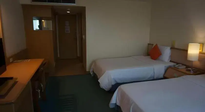 Bed in The Majestic Sakon Nakhon Hotel Bed in The Majestic Sakon Nakhon Hotel