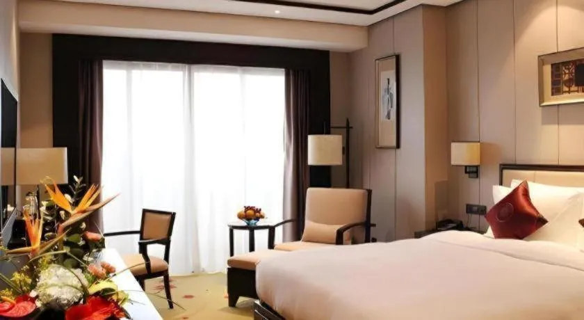 Bed in Xiang Yun Sha Garden Hotel