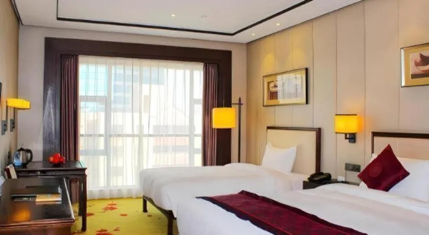 Bed in Xiang Yun Sha Garden Hotel