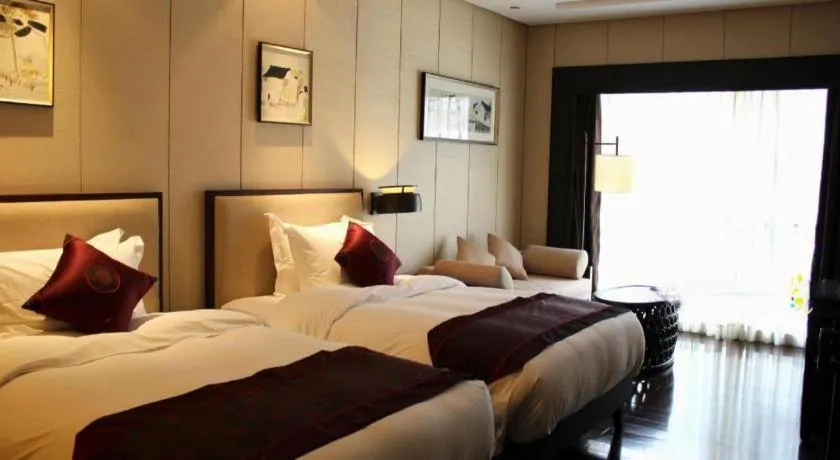 Bed in Xiang Yun Sha Garden Hotel