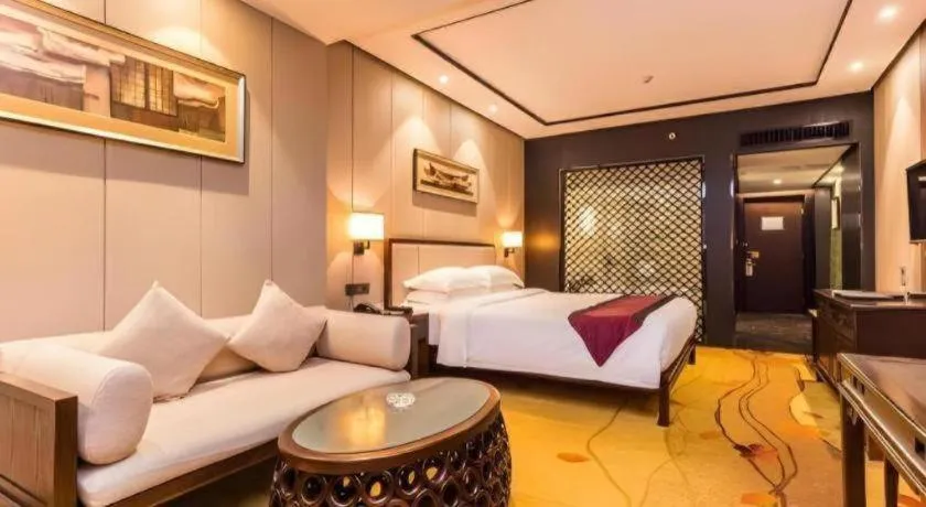 Bed in Xiang Yun Sha Garden Hotel