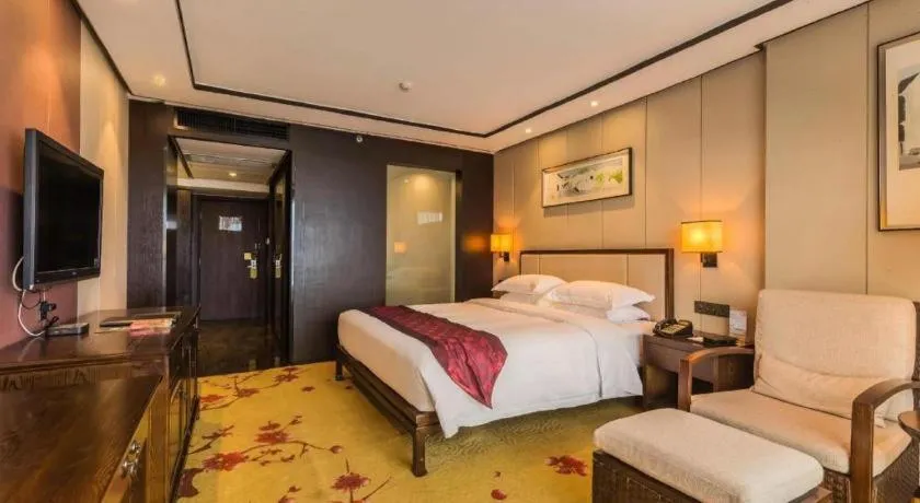 Bed in Xiang Yun Sha Garden Hotel