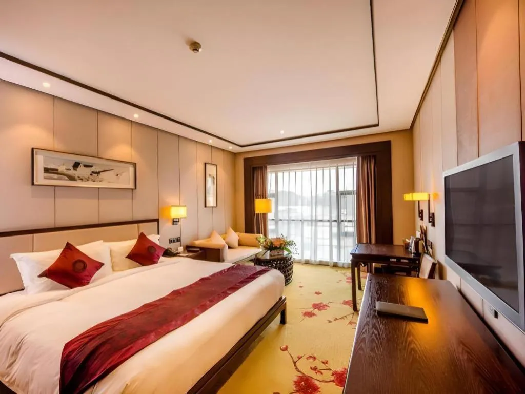 Bed in Xiang Yun Sha Garden Hotel