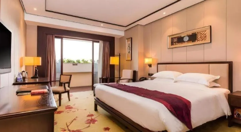 Bed in Xiang Yun Sha Garden Hotel
