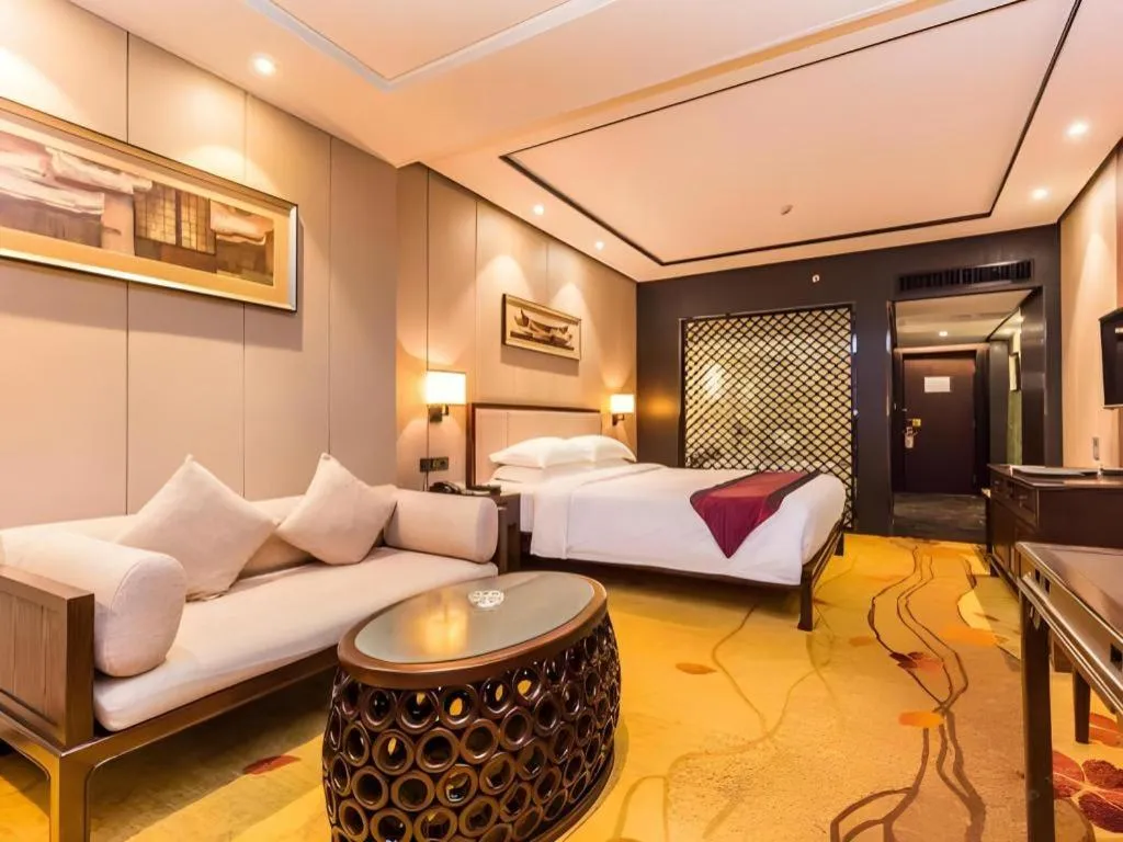 Bed in Xiang Yun Sha Garden Hotel