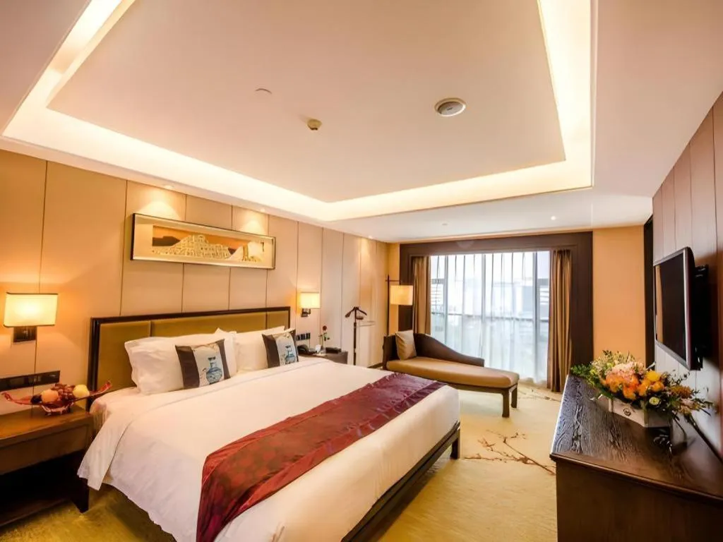 Bed in Xiang Yun Sha Garden Hotel