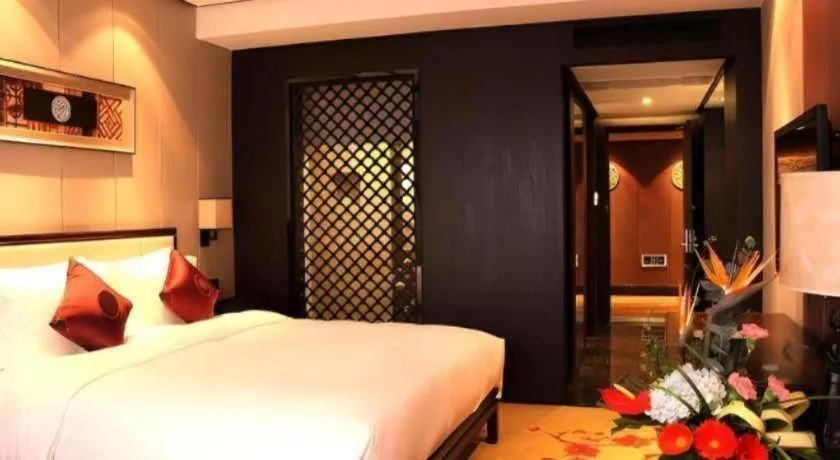 Bed in Xiang Yun Sha Garden Hotel