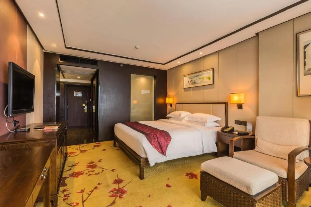 Bed in Xiang Yun Sha Garden Hotel