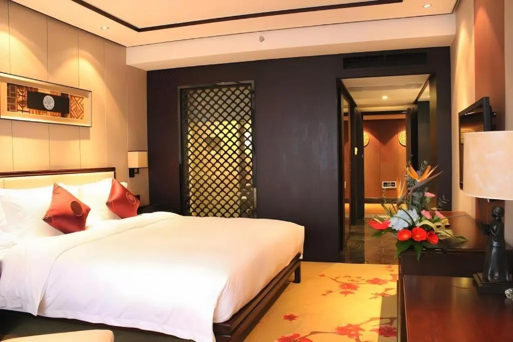 Bed in Xiang Yun Sha Garden Hotel