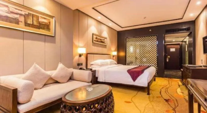 Bed in Xiang Yun Sha Garden Hotel